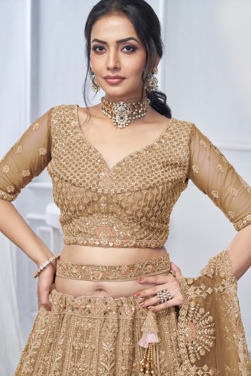 "Introducing the Royal Grandeur Bridal Golden Lehenga!