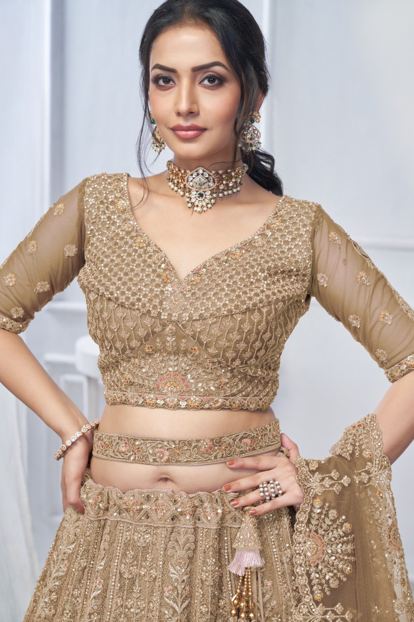 "Introducing the Royal Grandeur Bridal Brown Lehenga!